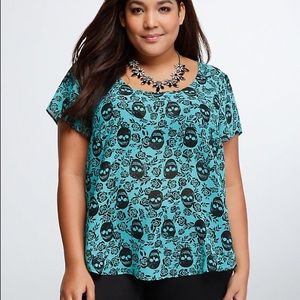 Teal skull top with buttons down the back